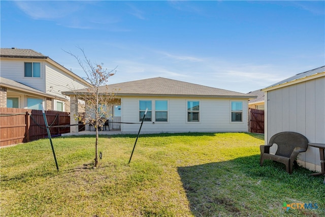 6424 Treiber Dr, Temple, TX 76502 - rear view of house with a fenced backyard