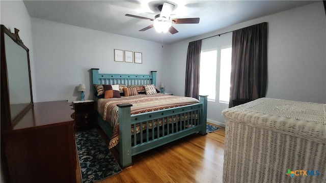 1804 N Goldman St, Victoria, TX 77901 - bedroom with wood finished floors and a ceiling fan