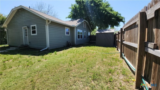 1804 N Goldman St, Victoria, TX 77901 - fenced backyard featuring a storage shed