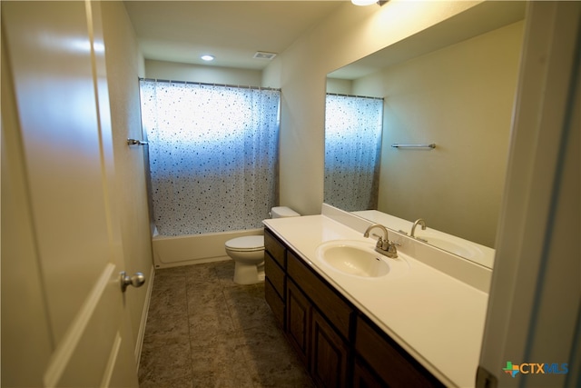 full bathroom featuring tile patterned floors, vanity, toilet, and  shower combination