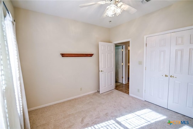 1802 N Vine St, Victoria, TX 77901 - unfurnished bedroom featuring carpet floors, a closet, and ceiling fan