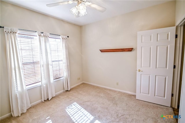 1802 N Vine St, Victoria, TX 77901 - carpeted empty room with a ceiling fan and baseboards