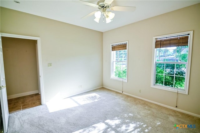 1802 N Vine St, Victoria, TX 77901 - carpeted empty room featuring a ceiling fan and baseboards