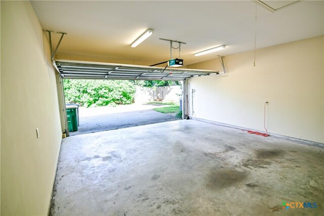 1802 N Vine St, Victoria, TX 77901 - garage with a garage door opener