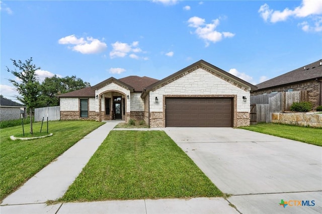 8306 Callahan Dr, Killeen, TX 76542 - french country inspired facade with an attached garage, concrete driveway, and brick siding