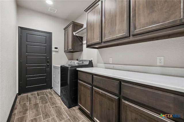 8306 Callahan Dr, Killeen, TX 76542 - laundry room with cabinet space, independent washer and dryer, and wood finish floors