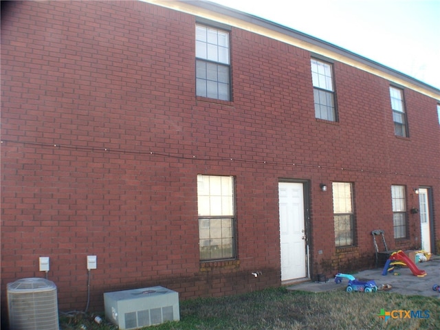 view of home's exterior featuring cooling unit