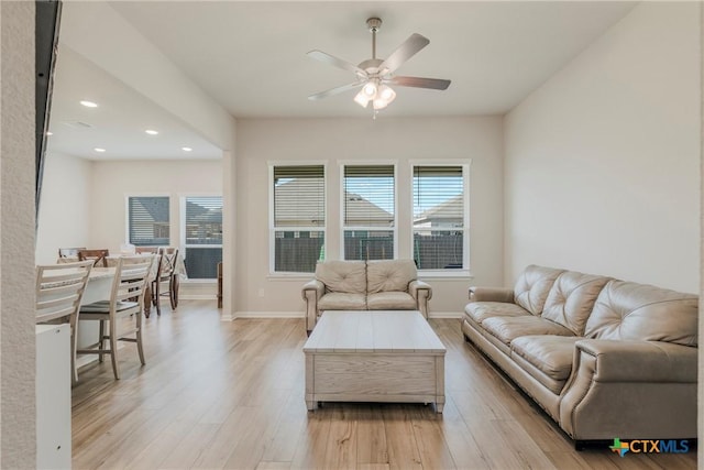 707 Winscott Ave, Temple, TX 76502 - living area featuring plenty of natural light, light wood finished floors, ceiling fan, recessed lighting, and baseboards