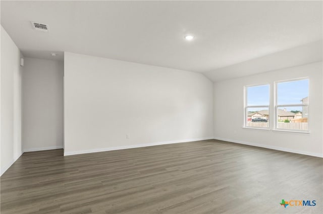 3812 Keller Rd, Temple, TX 76504 - unfurnished room with wood finished floors, vaulted ceiling, and recessed lighting