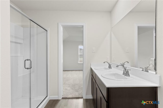 3812 Keller Rd, Temple, TX 76504 - full bath with wood finished floors, double vanity, and a shower stall
