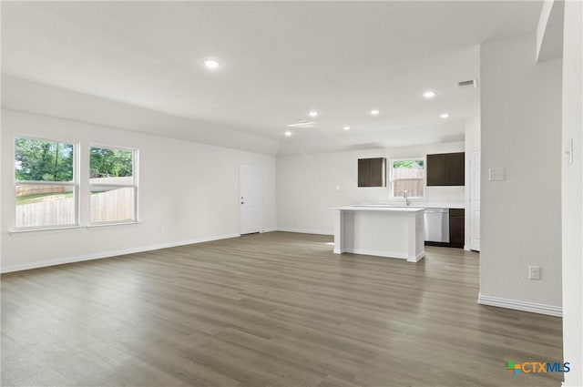 3812 Keller Rd, Temple, TX 76504 - unfurnished living room with recessed lighting and wood finished floors