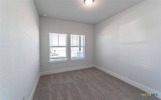 513 Lina Way, Seguin, TX 78155 - carpeted spare room with baseboards