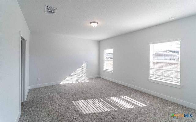 513 Lina Way, Seguin, TX 78155 - spare room with carpet flooring and baseboards