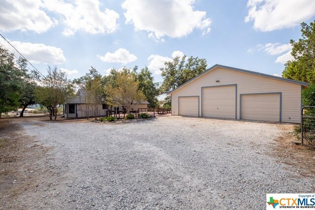 121 S Scenic Loop, Canyon Lake, TX 78133 - detached garage with fence