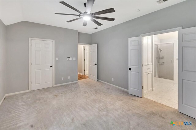 105 Legend Dr, Victoria, TX 77904 - unfurnished bedroom with light carpet, baseboards, lofted ceiling, ensuite bath, and ceiling fan