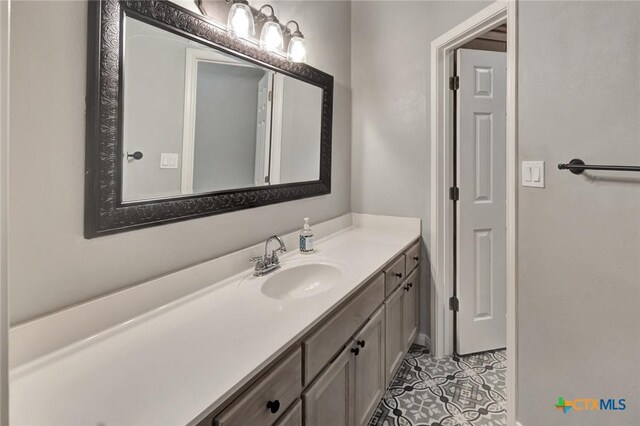 105 Legend Dr, Victoria, TX 77904 - bathroom with vanity and tile patterned floors