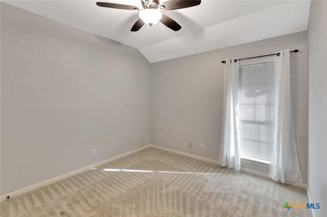105 Legend Dr, Victoria, TX 77904 - unfurnished room featuring light colored carpet, baseboards, a ceiling fan, and vaulted ceiling
