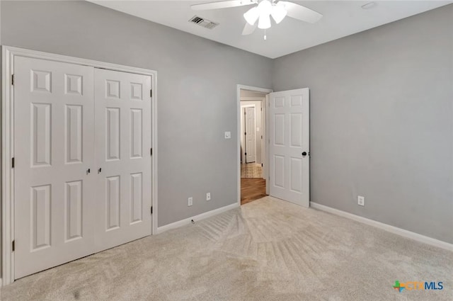 105 Legend Dr, Victoria, TX 77904 - unfurnished bedroom with carpet, baseboards, a closet, and ceiling fan