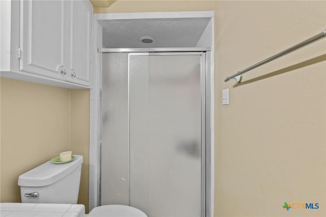 203 Yorkshire Ln, Victoria, TX 77904 - full bathroom featuring toilet and a shower stall