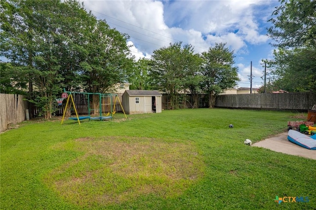 203 Yorkshire Ln, Victoria, TX 77904 - fenced backyard with a playground and a storage shed