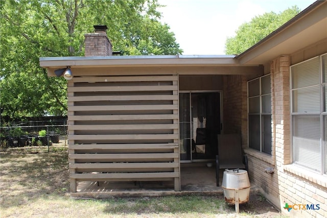 details with fence and brick siding