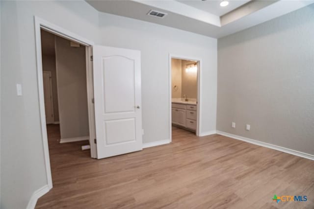 unfurnished bedroom featuring recessed lighting, visible vents, baseboards, and light wood finished floors