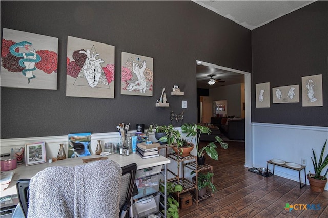 home office with a ceiling fan and dark wood-style flooring