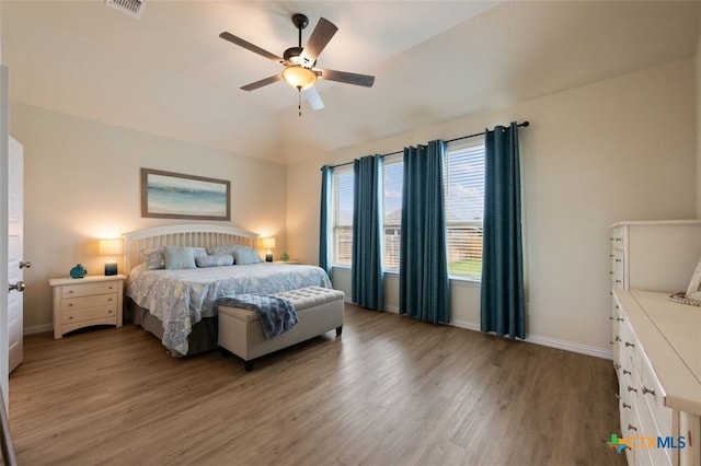 3301 Amerigo Pl, Round Rock, TX 78665 - bedroom featuring light wood-style flooring, baseboards, vaulted ceiling, and a ceiling fan
