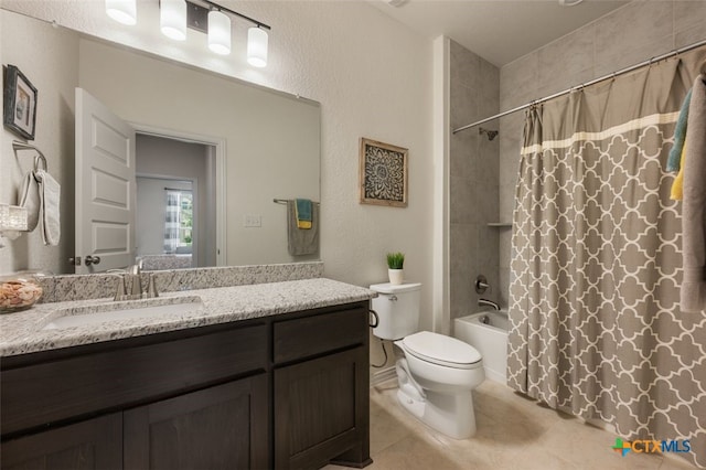3301 Amerigo Pl, Round Rock, TX 78665 - bathroom featuring vanity, toilet, shower / bath combo with shower curtain, tile patterned floors, and a textured wall