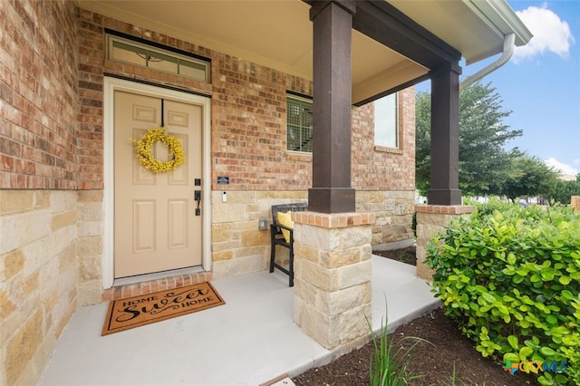 3301 Amerigo Pl, Round Rock, TX 78665 - doorway to property with a porch and brick siding