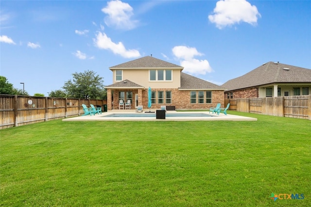 3301 Amerigo Pl, Round Rock, TX 78665 - back of house with a patio and brick siding