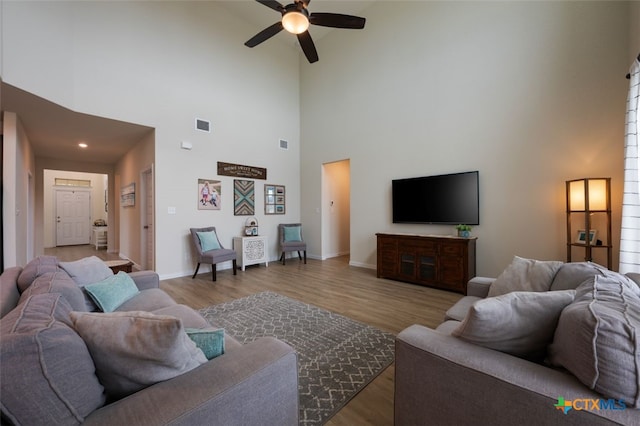 3301 Amerigo Pl, Round Rock, TX 78665 - living area with high vaulted ceiling, a ceiling fan, wood finished floors, baseboards, and recessed lighting