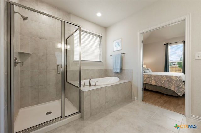 3301 Amerigo Pl, Round Rock, TX 78665 - ensuite bathroom featuring a bath, a shower stall, and tile patterned floors