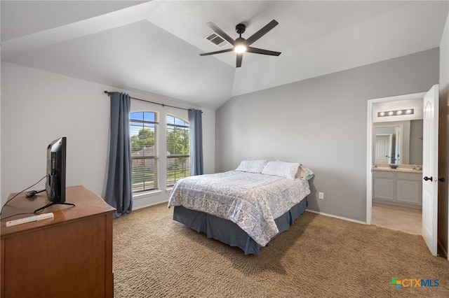 3416 Winding Shore Ln, Pflugerville, TX 78660 - bedroom with light colored carpet, vaulted ceiling, ceiling fan, and ensuite bath