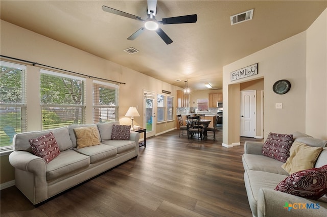 3416 Winding Shore Ln, Pflugerville, TX 78660 - living area featuring a ceiling fan and dark wood finished floors