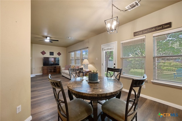 3416 Winding Shore Ln, Pflugerville, TX 78660 - dining area featuring dark wood finished floors and ceiling fan