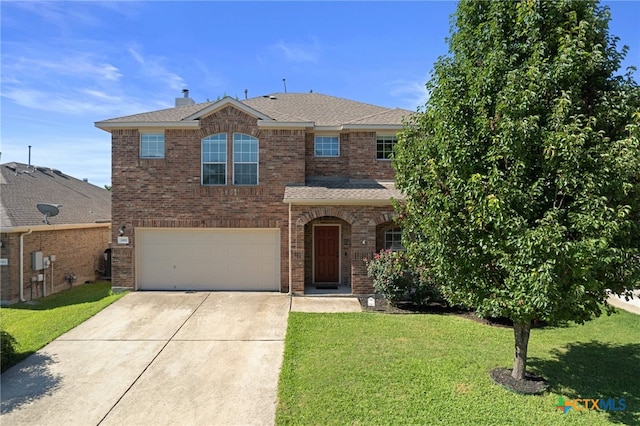 3416 Winding Shore Ln, Pflugerville, TX 78660 - traditional-style house featuring driveway, a garage, brick siding, a front lawn, and roof with shingles