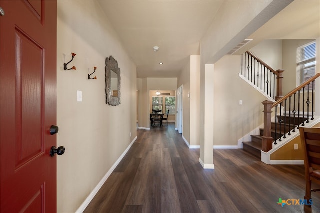 3416 Winding Shore Ln, Pflugerville, TX 78660 - foyer with plenty of natural light, wood finished floors, and stairs
