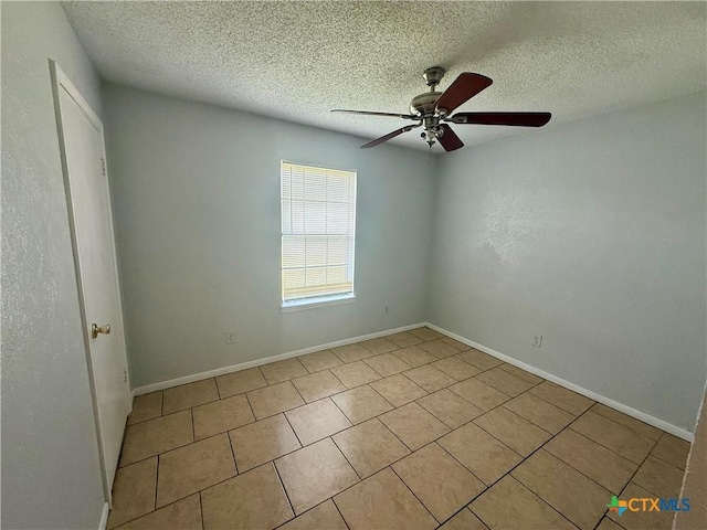 2102 Spicewood Dr, Killeen, TX 76543 - tiled empty room with ceiling fan and a textured ceiling