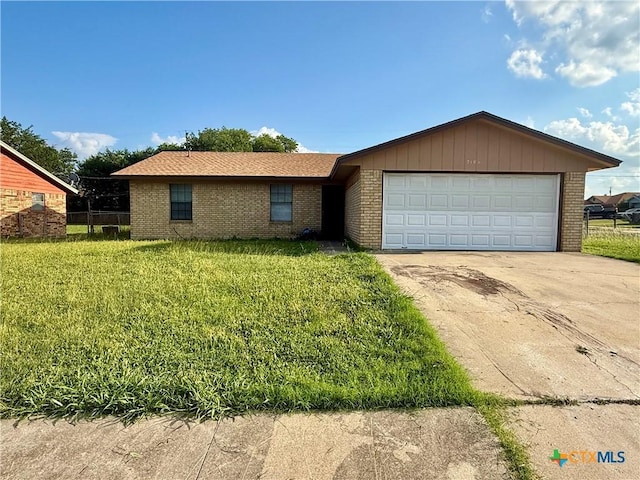 2102 Spicewood Dr, Killeen, TX 76543 - ranch-style house featuring brick siding, concrete driveway, and an attached garage
