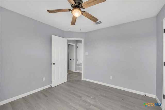 508 Taurus Dr, Killeen, TX 76542 - spare room with baseboards, wood finished floors, and ceiling fan
