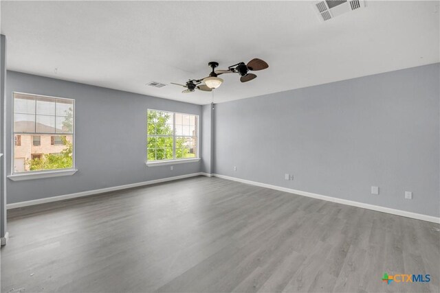 508 Taurus Dr, Killeen, TX 76542 - spare room with ceiling fan, wood finished floors, and baseboards
