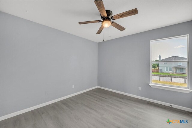 508 Taurus Dr, Killeen, TX 76542 - spare room with wood finished floors, baseboards, and ceiling fan