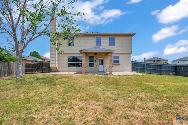 508 Taurus Dr, Killeen, TX 76542 - rear view of property with a patio area and a chimney