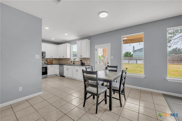 508 Taurus Dr, Killeen, TX 76542 - dining area featuring baseboards, light tile patterned floors, and recessed lighting