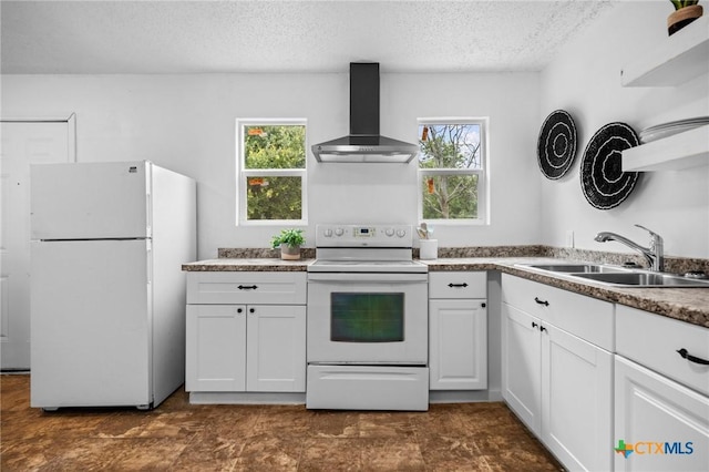 1304 E French Ave, Temple, TX 76501 - kitchen featuring white appliances, wall chimney exhaust hood, a sink, a textured ceiling, and healthy amount of natural light