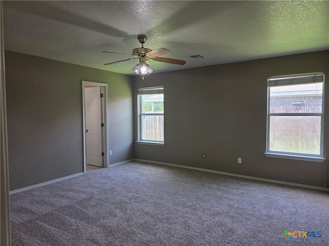 2803 Lindsey Dr, Copperas Cove, TX 76522 - empty room featuring carpet flooring, a textured ceiling, and ceiling fan