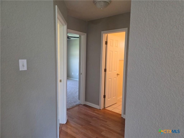 2803 Lindsey Dr, Copperas Cove, TX 76522 - corridor featuring a textured wall and wood finished floors
