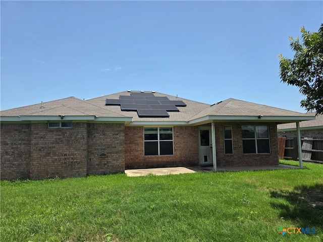 2803 Lindsey Dr, Copperas Cove, TX 76522 - rear view of property featuring a patio area, roof mounted solar panels, and brick siding
