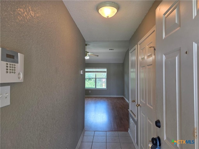 2803 Lindsey Dr, Copperas Cove, TX 76522 - hall with a textured wall and tile patterned floors